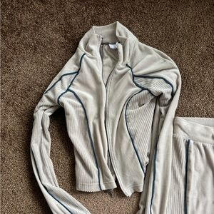 Out from under track suit